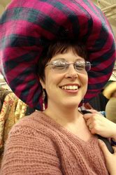 Nice hat, (coiro). We won't mention the other photo.