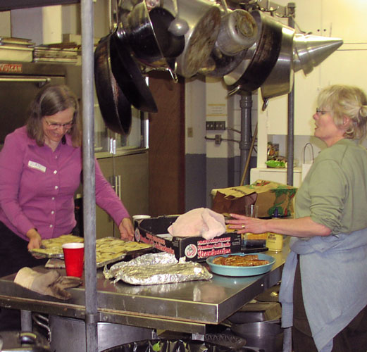 gail and davis prepping food in the PYC kitchen