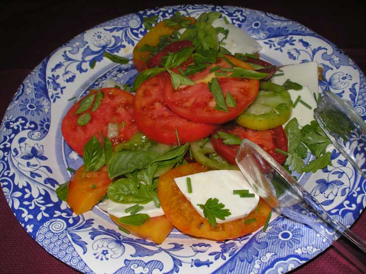 A gorgeous salad of heirloom tomatoes, basil and fresh mozzarella, courtesy of ronks